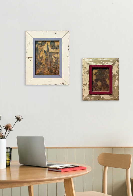 Studio con composizione di cornici a parete, tematica arte asiatica