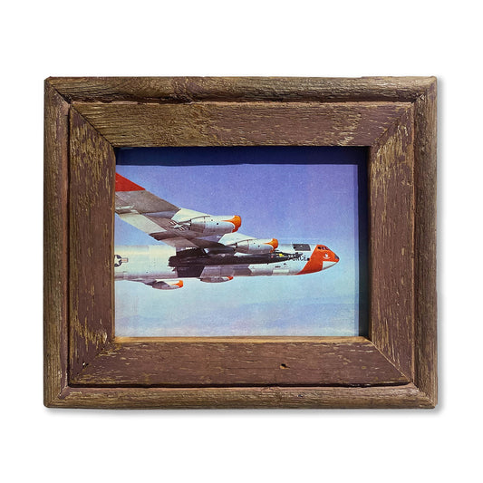 Immagine aerei in volo a colori in cornice viola. Cornice cape best dal Sudafrica