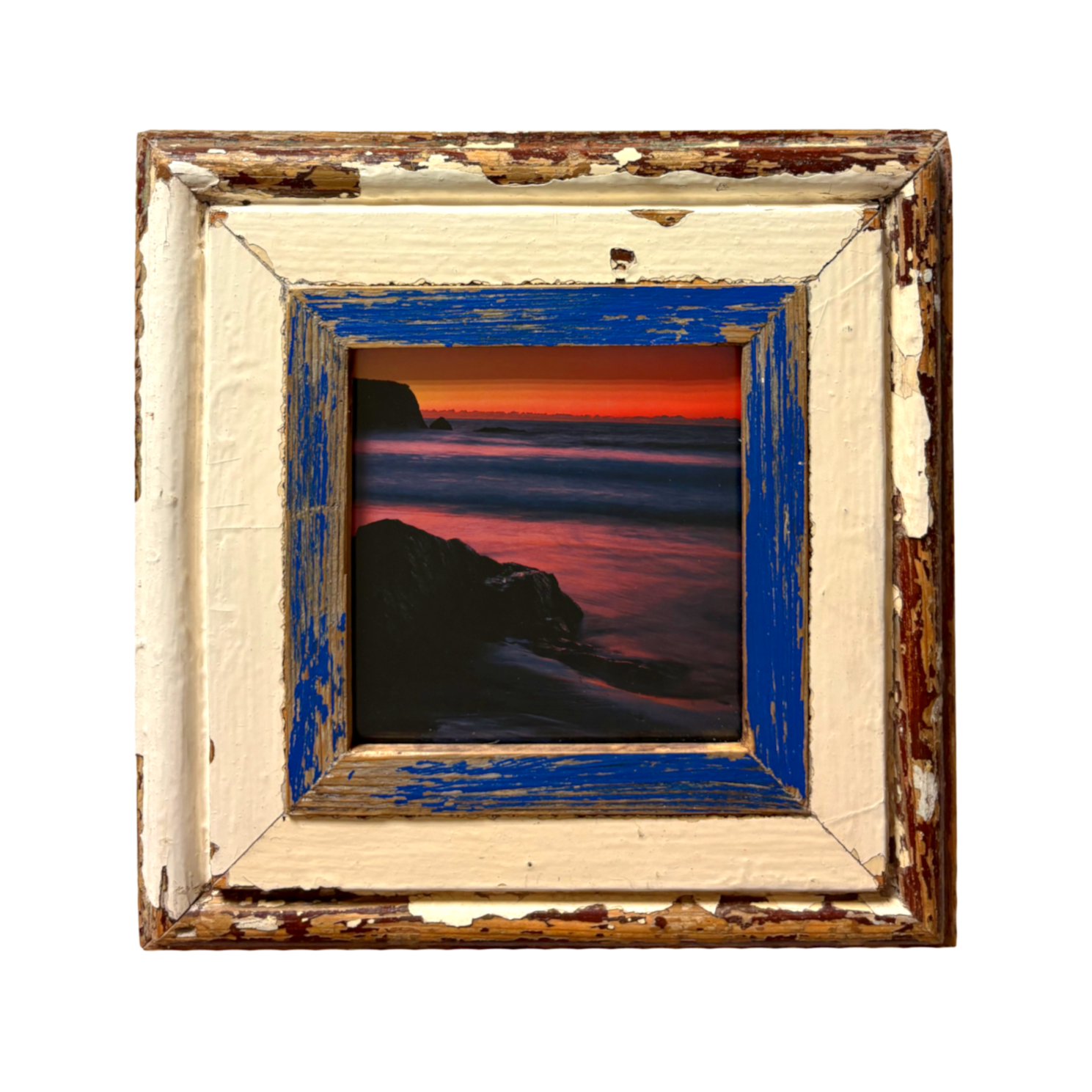 Cornice quadro crema e blu con immagine tramonto Cape Best